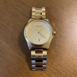 Gold unisex Gucci watch